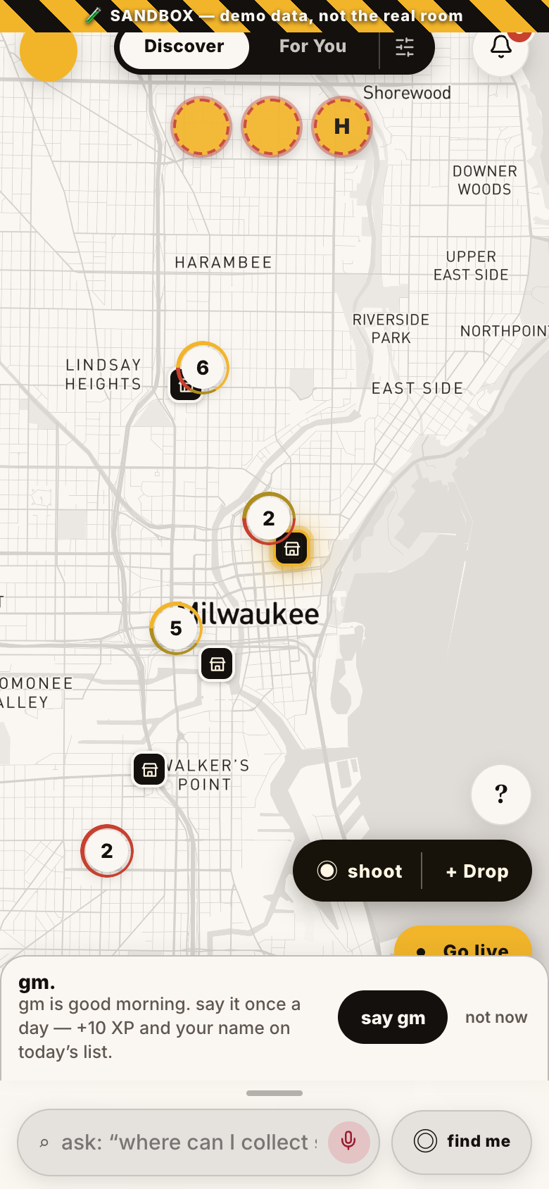 The GM Spaces map of Milwaukee: pins for rooms, drops, and people broadcasting live, with a prompt to say gm.